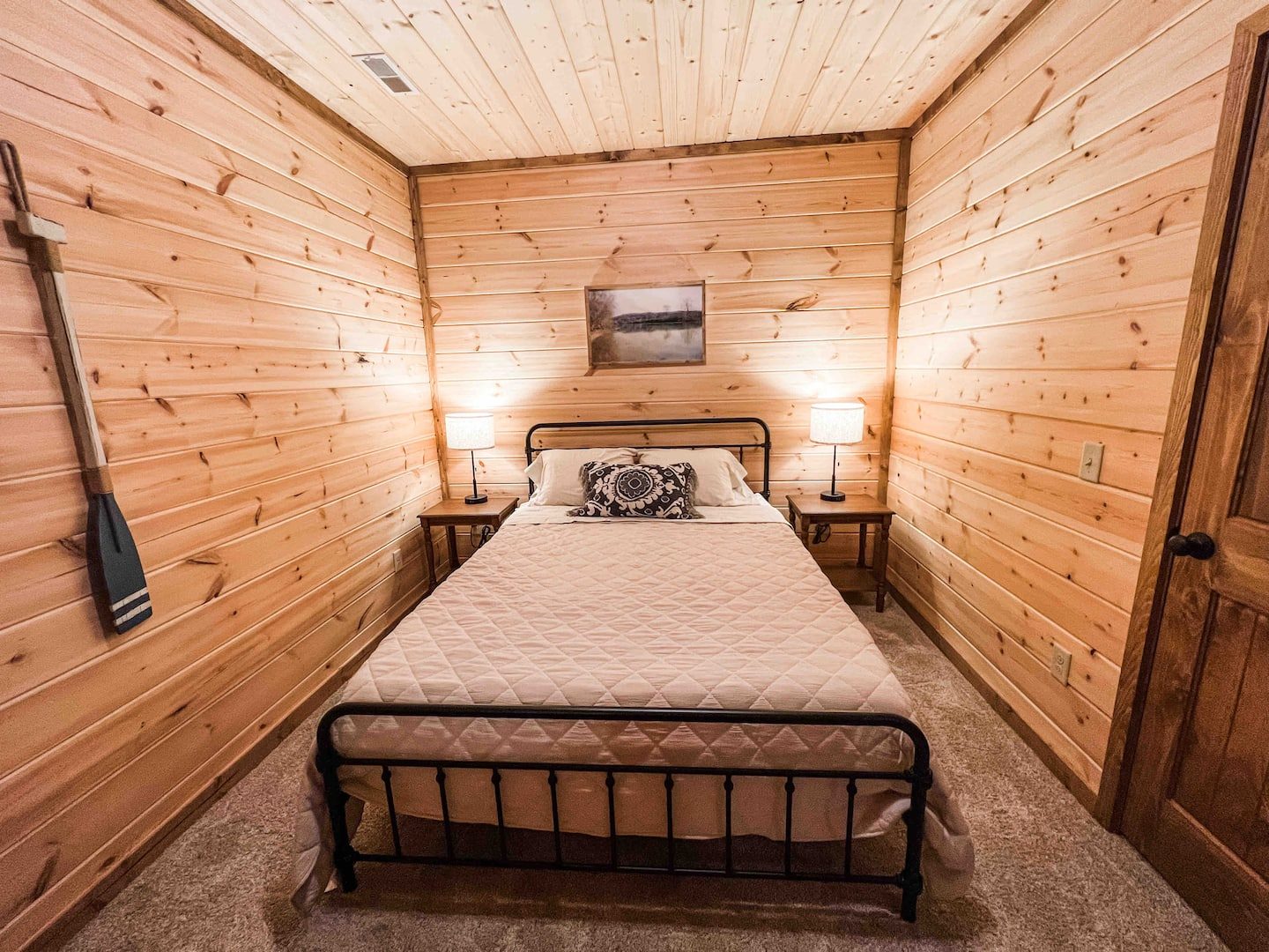 Guest bedroom with iron bed frame