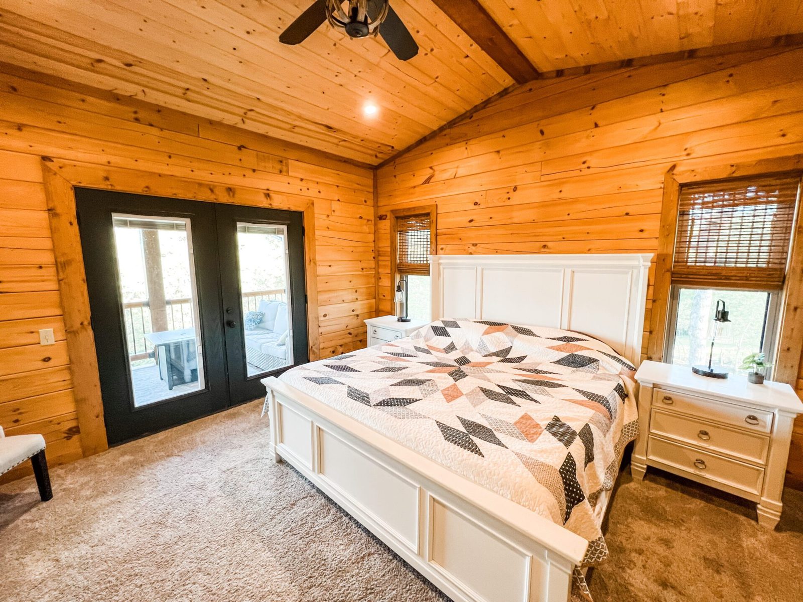 King suite with double doors to the back deck